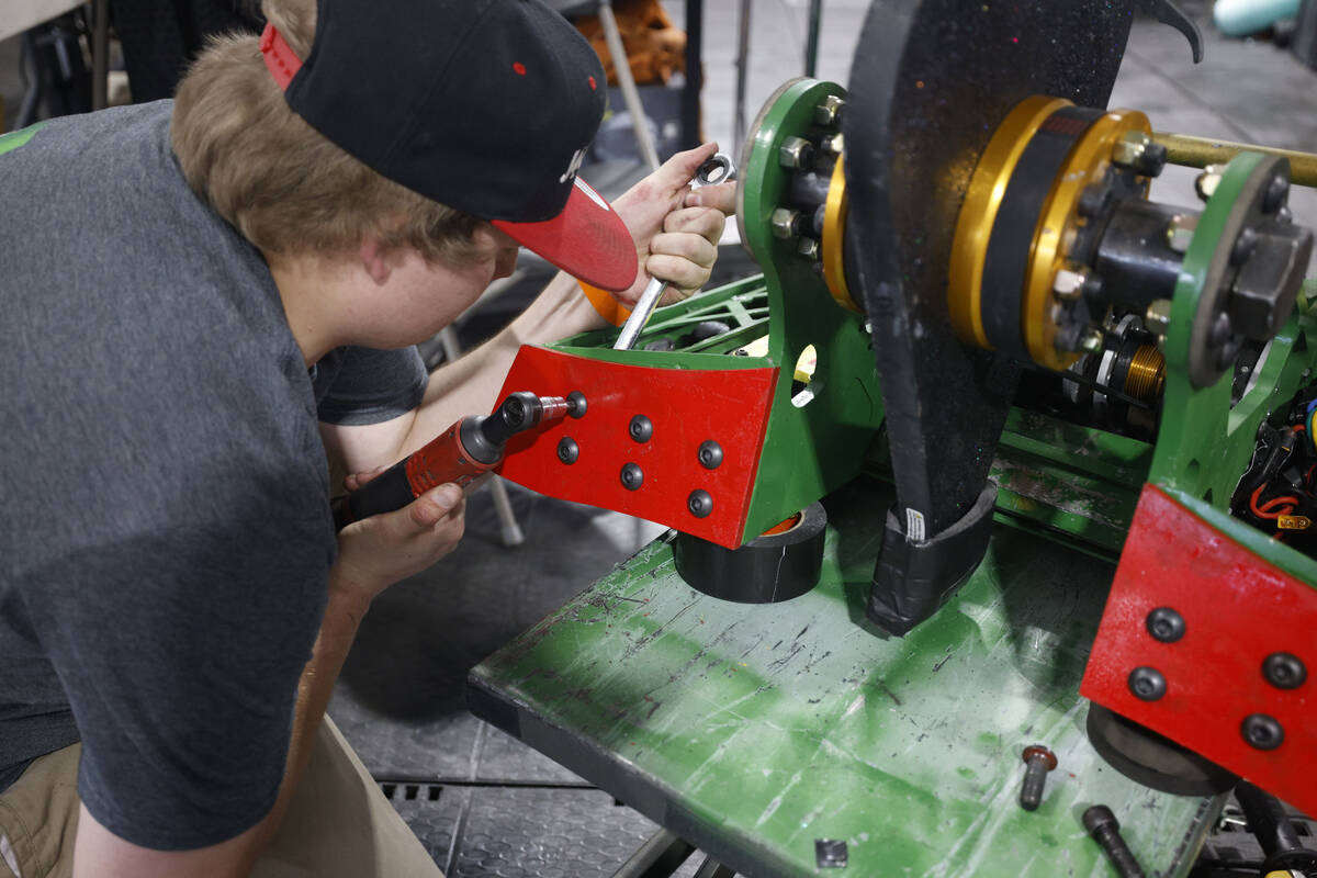 Vegas Combat Robotics team member Lucas Grell prepares their robot Jackpot for a battle in the ...