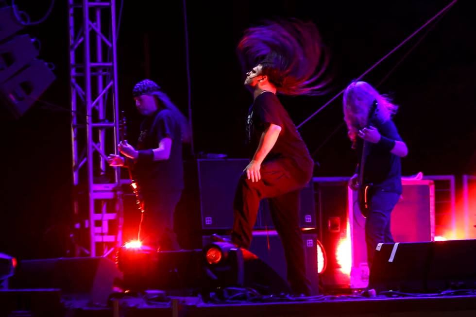 George Fisher, of Cannibal Corpse, center, performs during Psycho Las Vegas at Mandalay Bay in ...