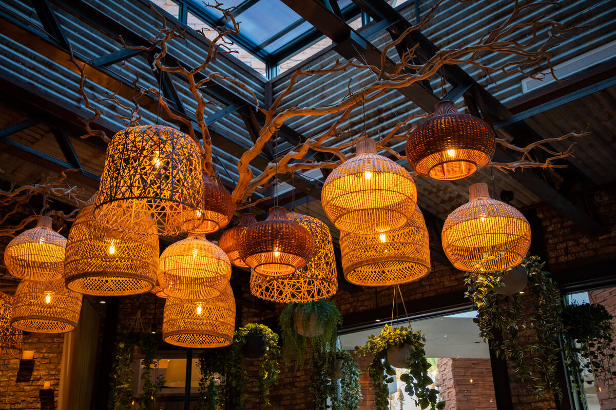 Lanterns hang from ornamental branches inside the new Lotus of Siam restaurant in Red Rock Reso ...