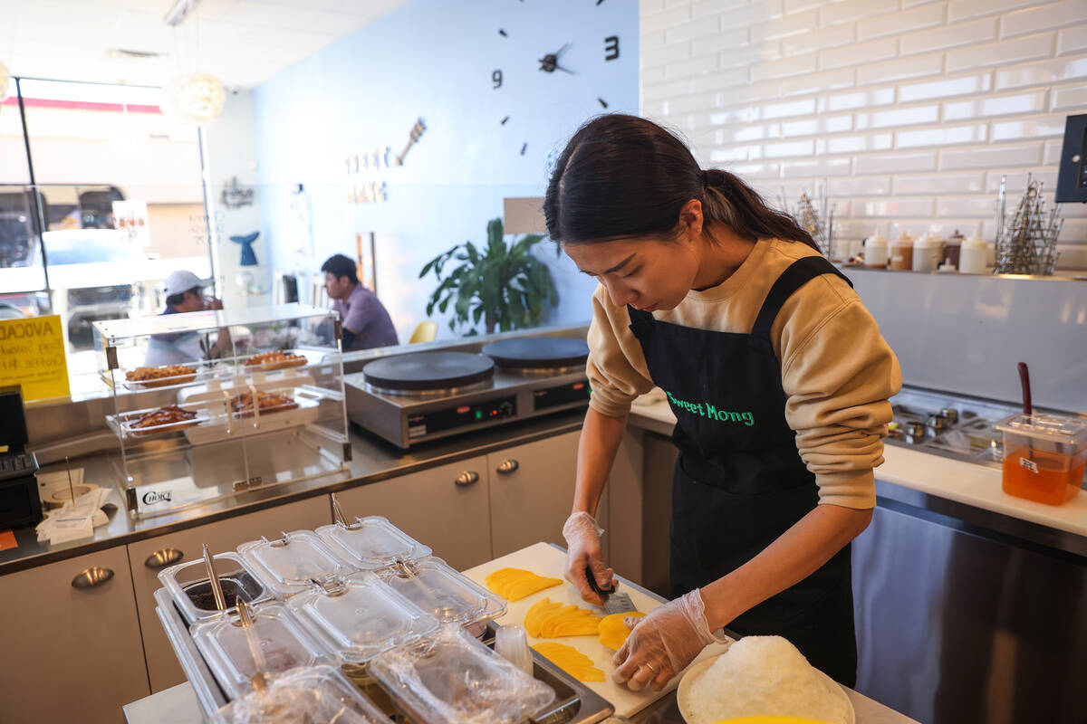 Amy Park, co-owner and manager, makes mango bingsoo, Korean shave ice, at Sweet Mong in Las Veg ...