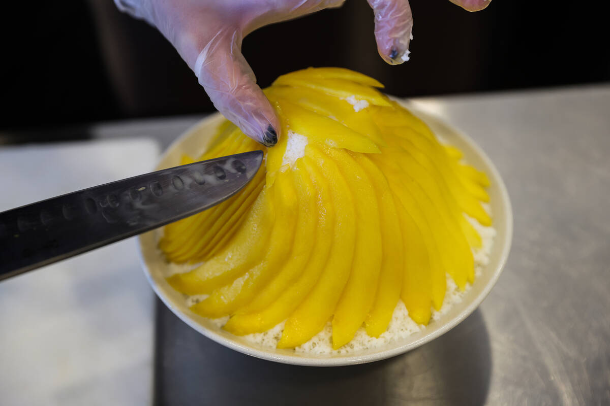 Amy Park, co-owner and manager, makes mango bingsoo, Korean shave ice, at Sweet Mong in Las Veg ...
