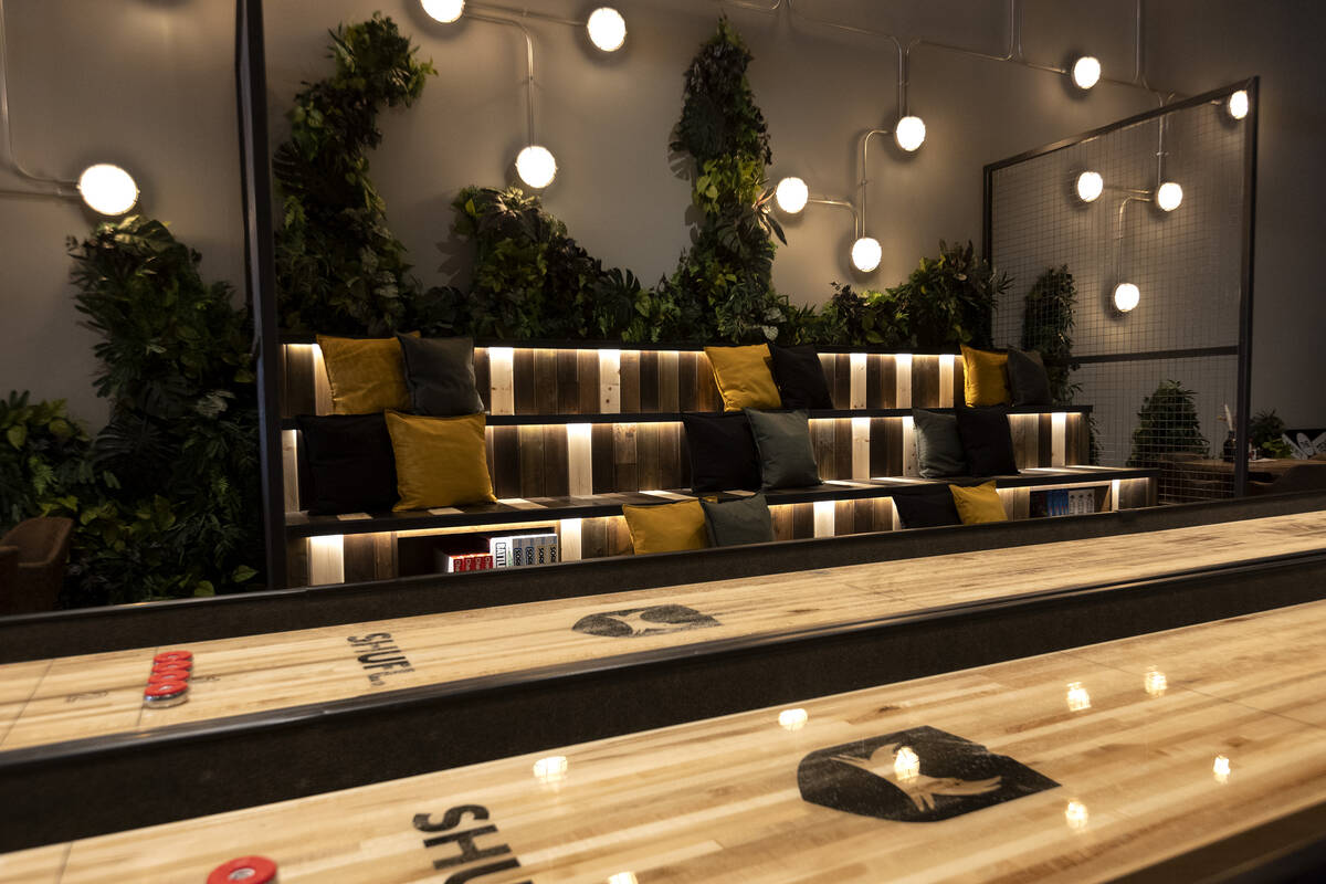 The inside of the new BrewDog atop Showcase Mall includes shuffleboard tables and communal seat ...