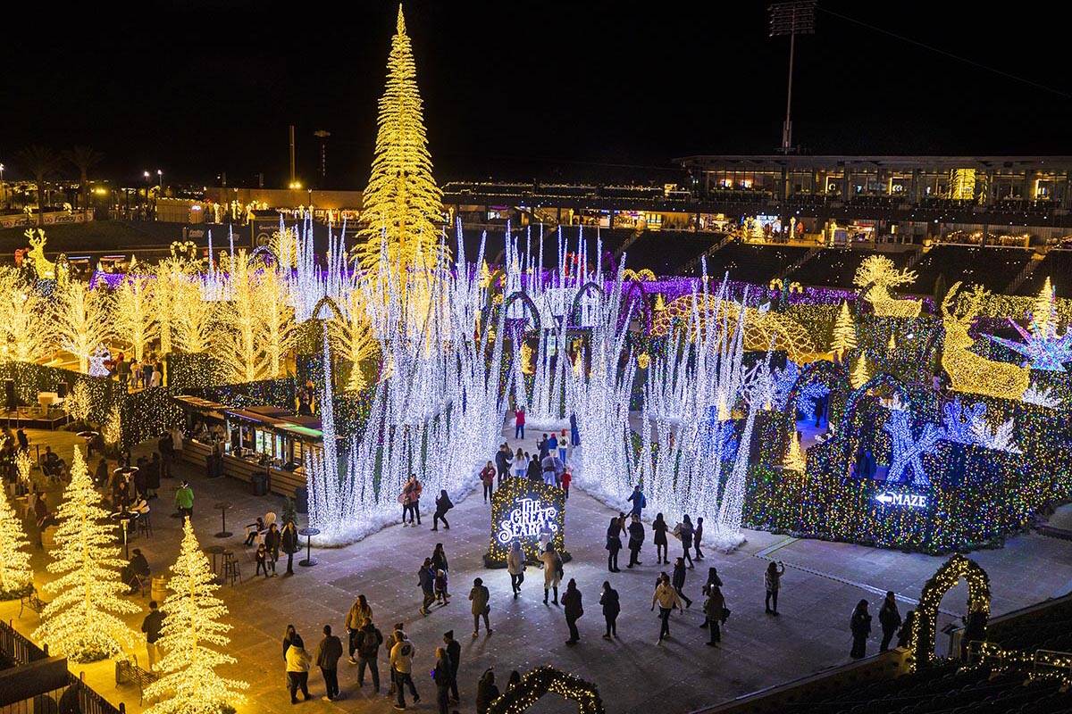 Attendees explore Enchant Christmas at Las Vegas Ballpark on Tuesday, Nov. 30, 2021, in Las Veg ...