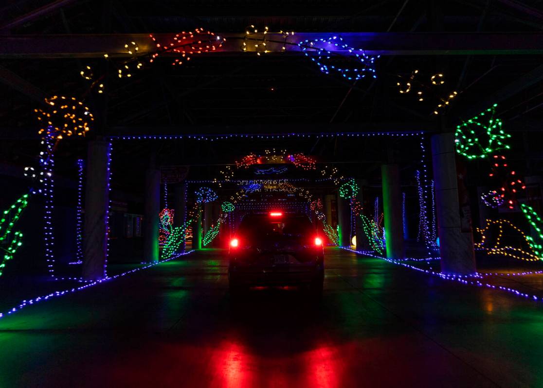 Cars tour through Glittering Lights at Las Vegas Motor Speedway in Las Vegas on Monday Nov. 30, ...
