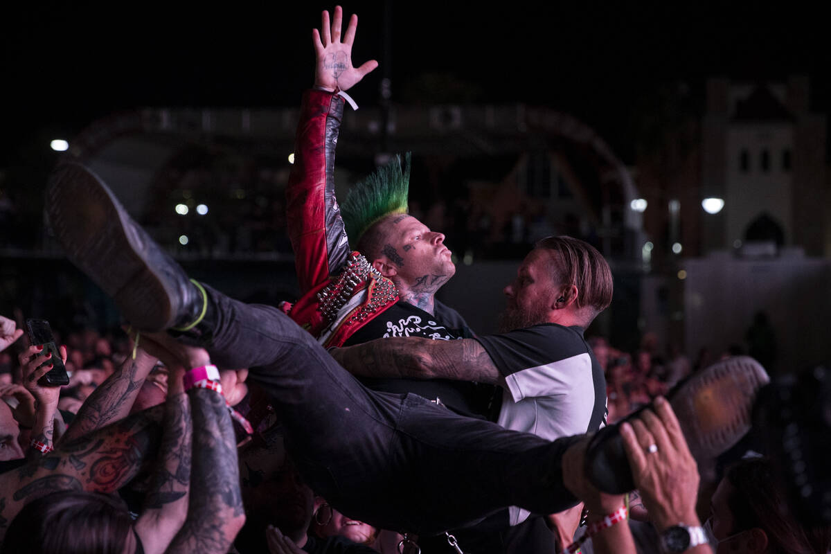 People listen to Streetlight Manifesto perform during the Punk Rock Bowling music festival at t ...