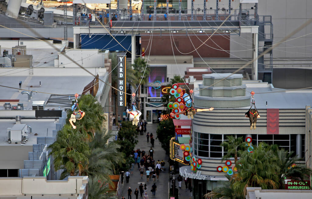 Guests on the new Fly Linq Zipline at the Linq Hotel in Las Vegas, Thursday, Nov. 1, 2018. Part ...