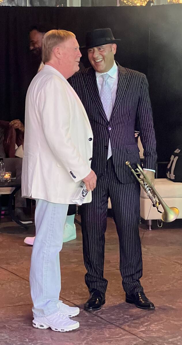 Raiders owner Mark Davis and David Perrico are shown at the Raiders' party honoring Cliff Branc ...