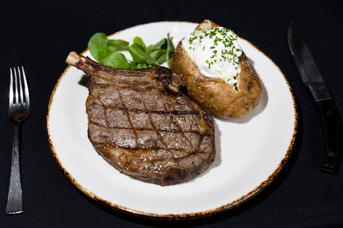 A 16-ounce bone-in ribeye is seen served at Silverado Steak House, at South Point hotel-casino ...