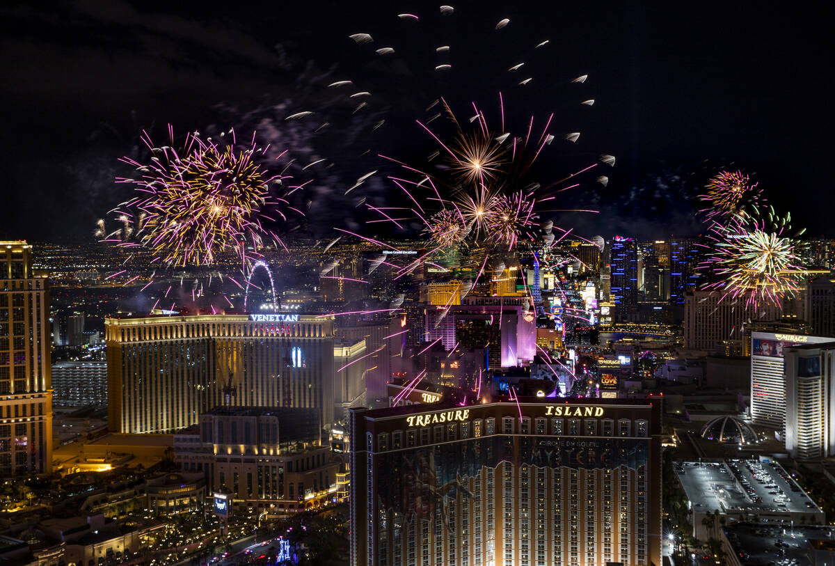 Fireworks explode over the Strip during New Year’s Eve celebrations on Saturday, Jan. 1, ...