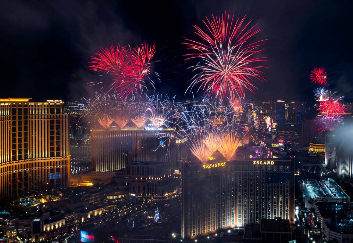 New Year’s fireworks erupt above the Strip viewed from atop the Trump Tower on Sunday, Jan. 1 ...