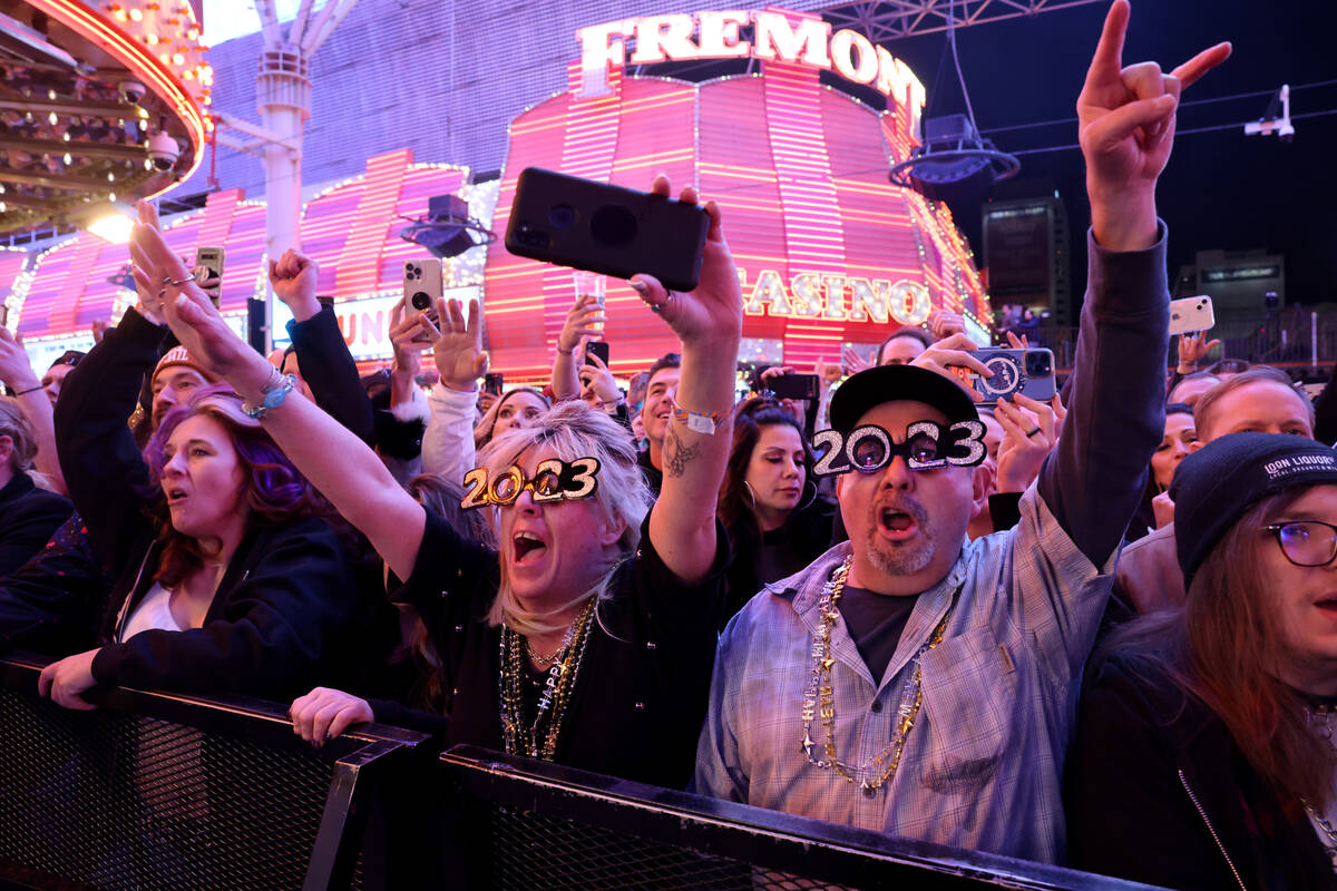 New Year’s Eve revelers, including Kathy Glover and her fiance, Michael Montoya of Castle Roc ...