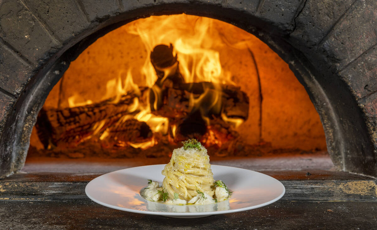 Spaghetti with jumbo crab, mascarpone-lemon crema, tarragon and caviar from the kitchen of chef ...