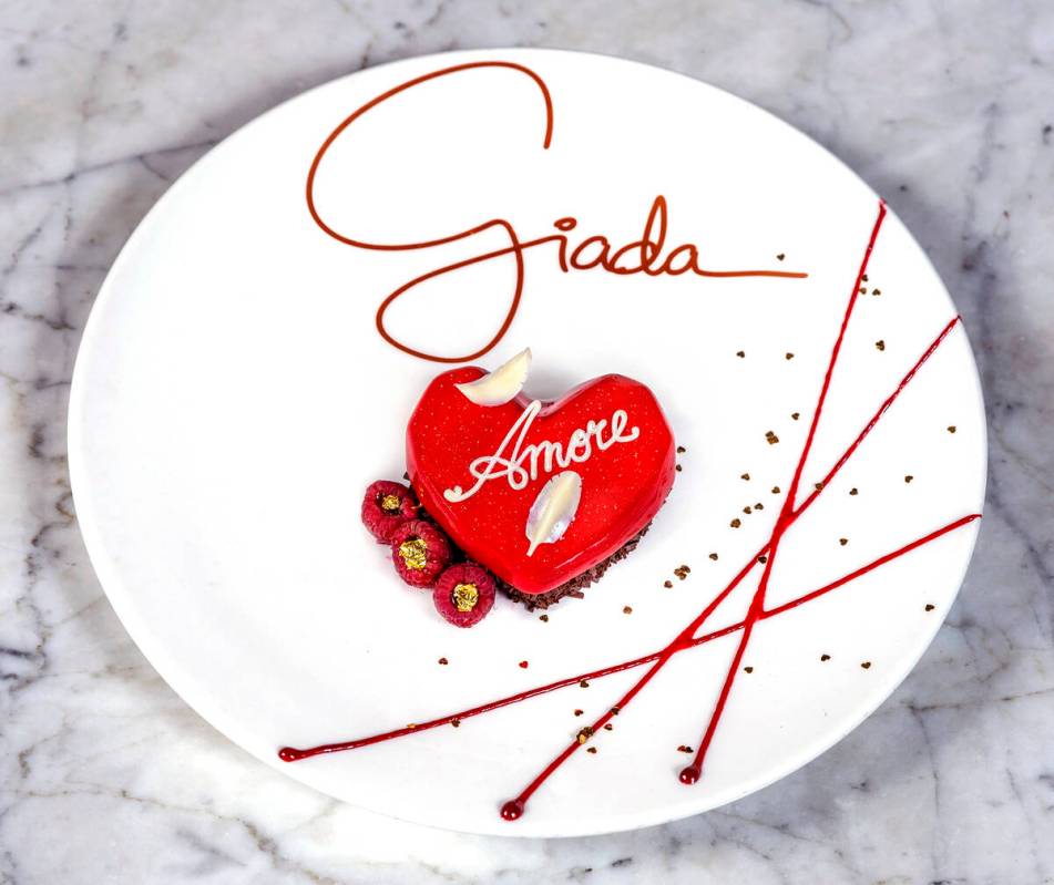 Chocolate Amore with chocolate-chocolate chip cake, caramel panna cotta, raspberry jam and whit ...