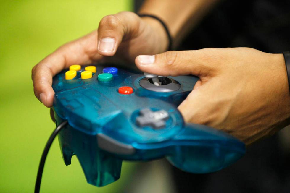 Marco Razo plays a video game on Sunday, May 14, 2017, at LVL Up Expo at Cashman Field in Las V ...