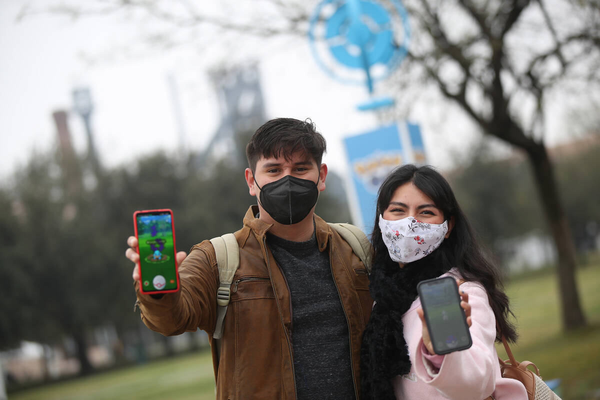 Trainers participate in a "Pokémon Go Tour" stop in February 2022. The “Pokémon Go Tour: Ho ...