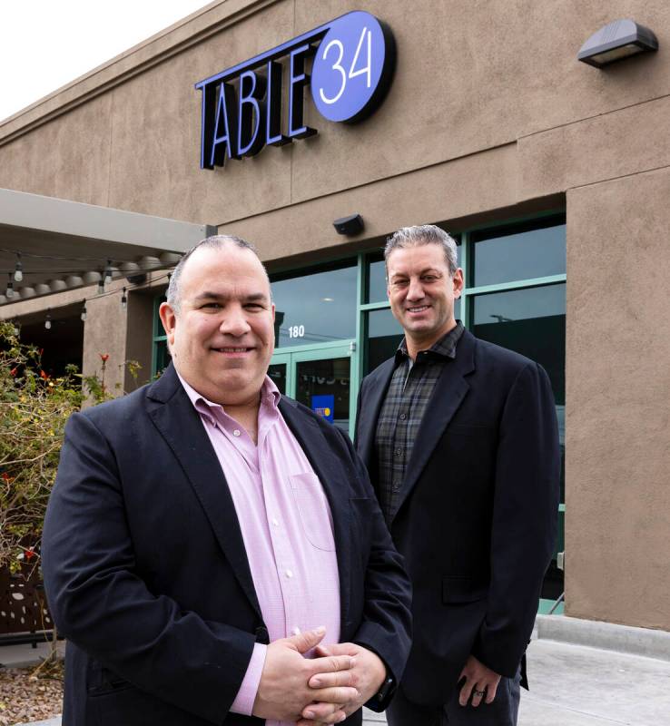 Table 34 owners Constantin Alexander, left, and Evan Glusman pose for a photo outside their Las ...