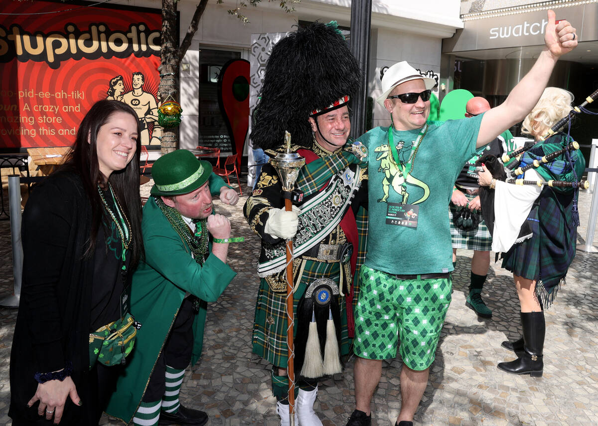 From left, Hannah Ablett of Grand Rapids, Mich., Joey “the Leprechaun” Minnich of Ireland, ...
