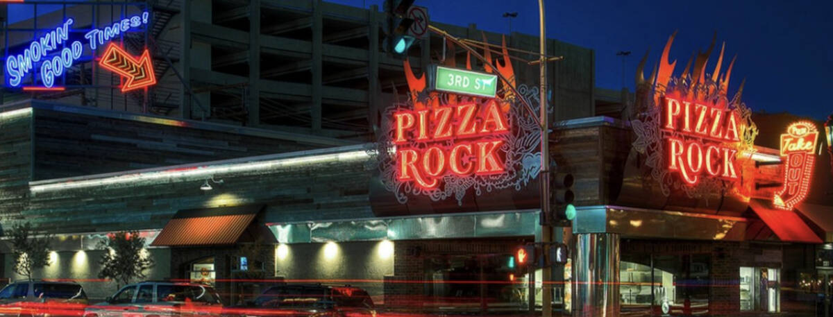 A pizza tailgate to raise money to feed the hungry takes place April 26, 2023, outside Pizza Ro ...