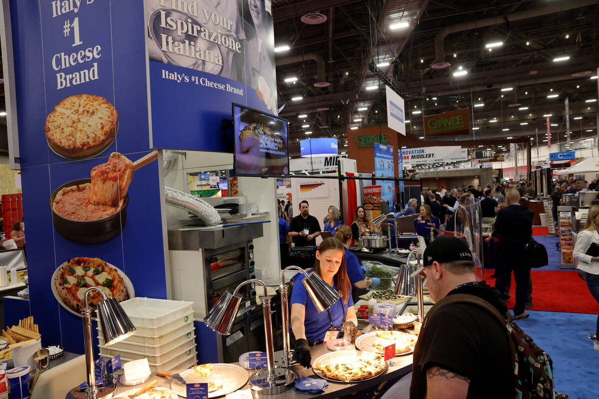 Emillie Wright of Lactalis Culinary offers pizza samples featuring Galbani Professionale cheese ...