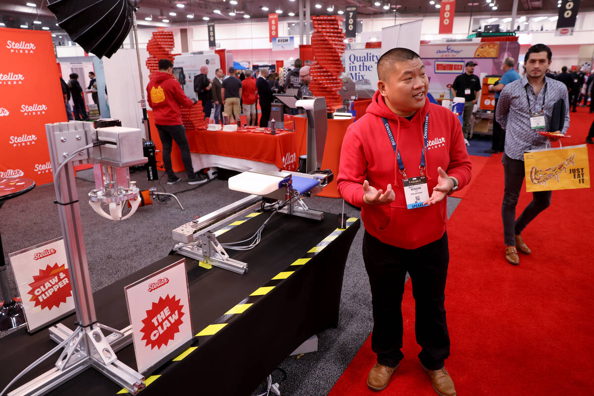 Benson Tsai of Stellar Pizza talks about his robot-made pizza at the International Pizza Expo a ...