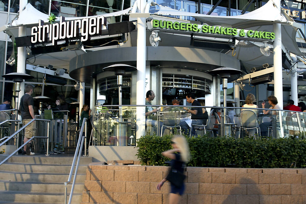 The Stripburger open-air restaurant at Fashion Show mall on the Las Vegas Strip is shown in thi ...