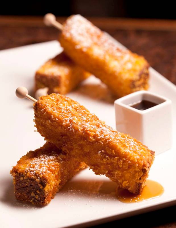 Batons of French toast are served at the passed small plates weekend brunch during spring 2023 ...