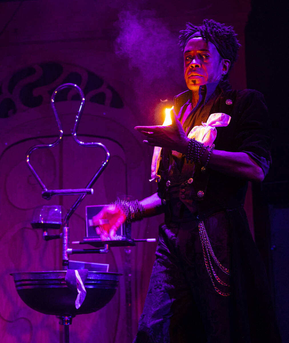 Magician Mondre performs in the The Seance Room at Lost Spirits Distillery on Sunday, April 2, ...