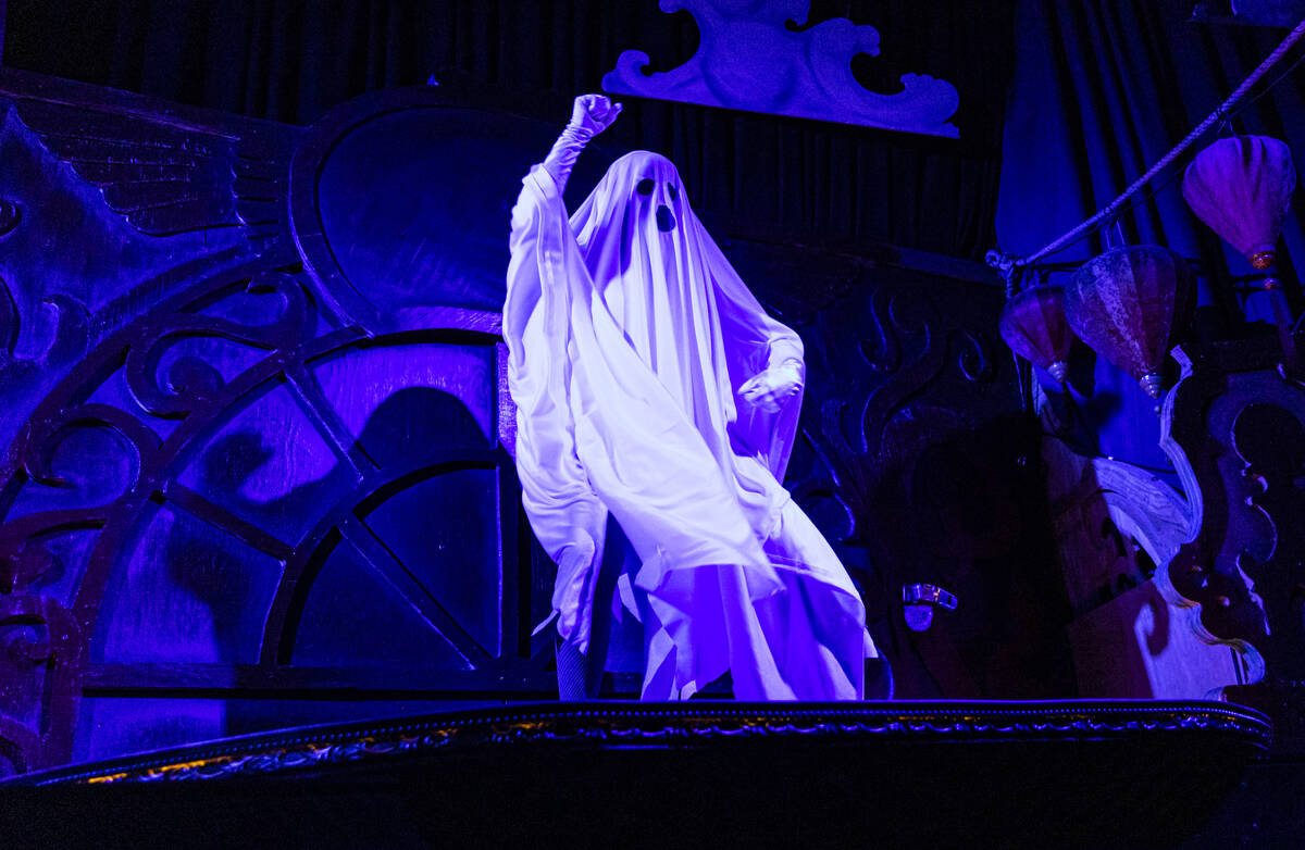 Burlesque artist Ginger Watson performs in the The Seance Room at Lost Spirits Distillery on Su ...