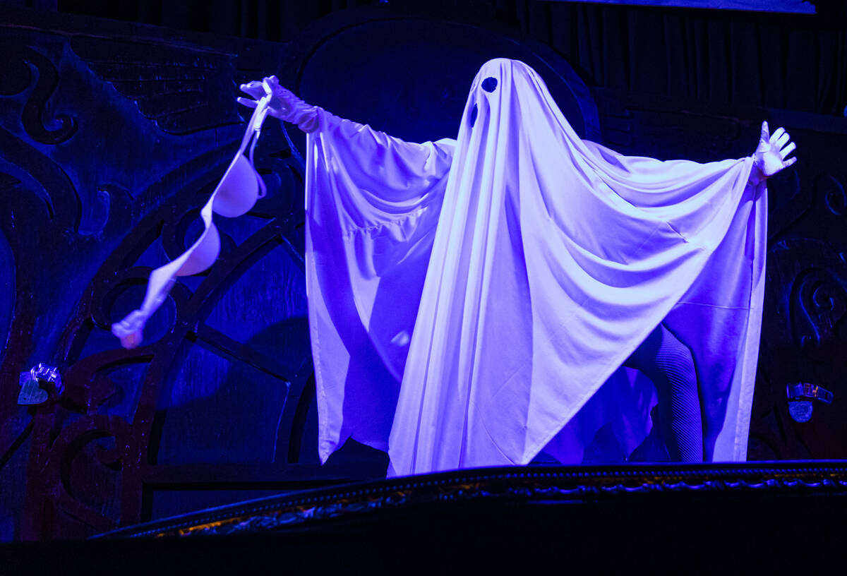 Burlesque artist Ginger Watson performs in the The Seance Room at Lost Spirits Distillery on Su ...