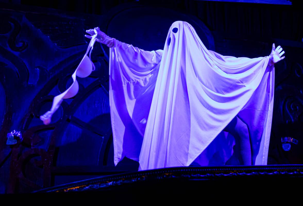 Burlesque artist Ginger Watson performs in the The Seance Room at Lost Spirits Distillery on Su ...