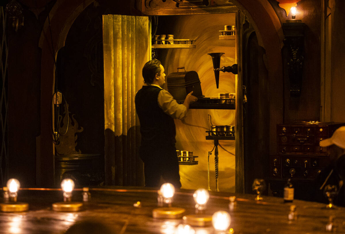 William Bradshaw retrieves a Thomas Edison phonograph during the The Seance Room at Lost Spirit ...