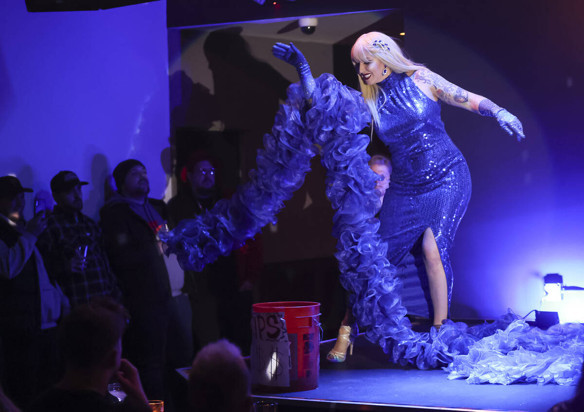 Burlesque artist I.L.Y. Royale with Cheese performs during Secret Circus at Artifice on Thursda ...