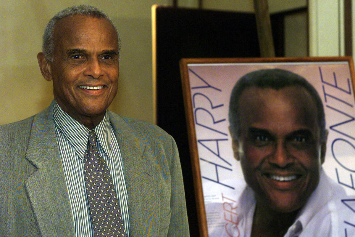 American singer Harry Belafonte poses for the media at the Adlon Hotel in Berlin, Germany, Dec. ...