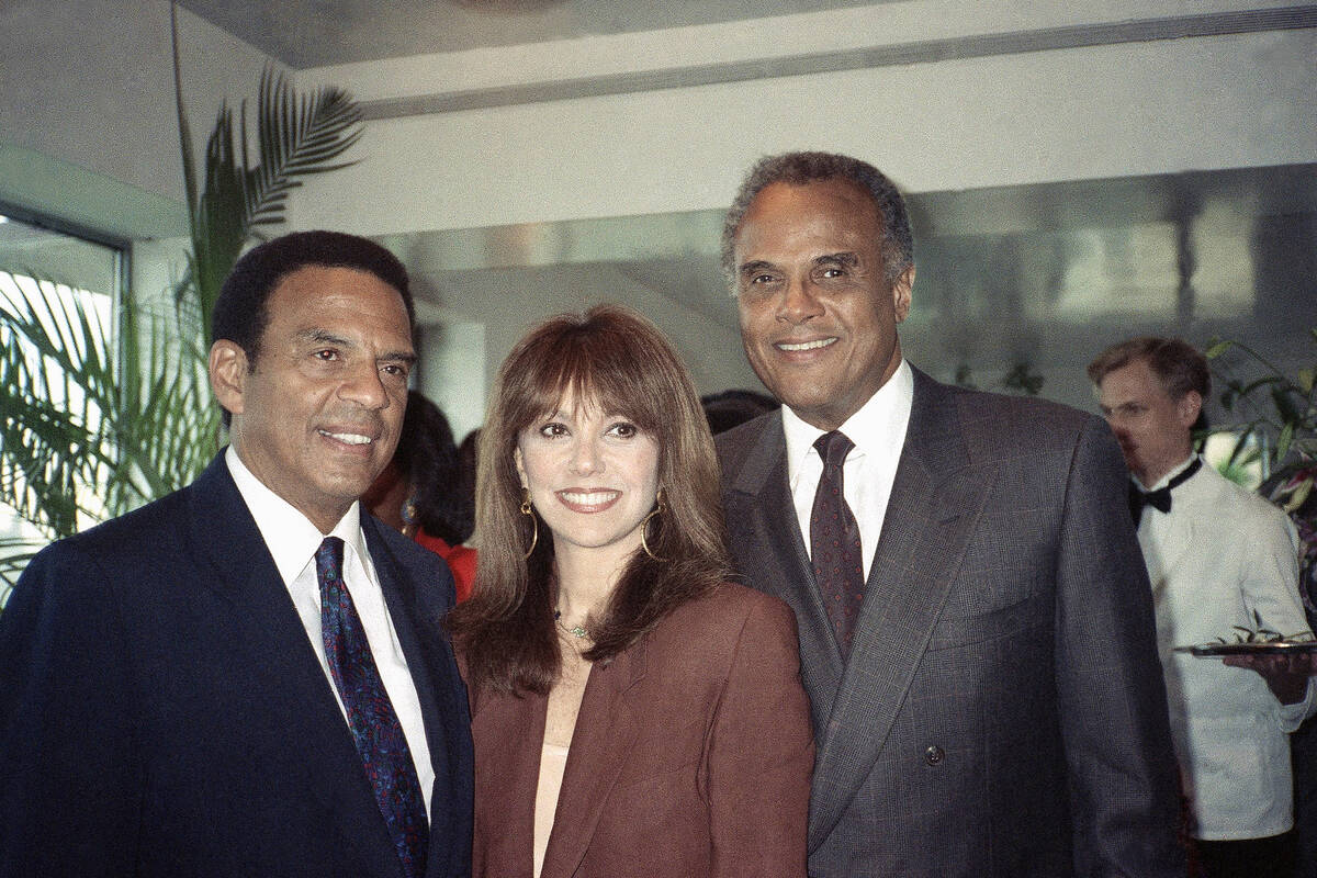 Georgia gubernatorial Candidate Andrew Young, left, is joined by Marlo Thomas and Harry Belafon ...