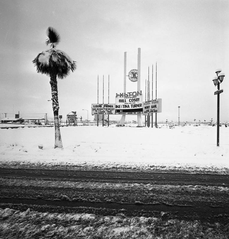 The marquee at the Las Vegas Hilton after a snowstorm touts Bill Cosby, Ike & Tina Turner, Loui ...