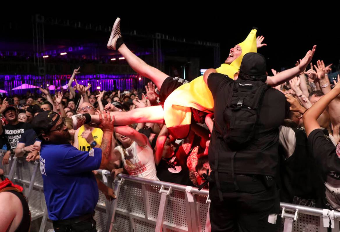 A fan in a banana suit crowd surfs during the Punk Rock Bowling music festival on Saturday, May ...