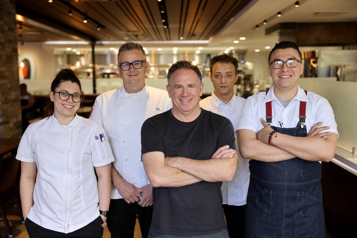 David Robins, center, at his new restaurant 1228 Main in the Arts District in Las Vegas Wednesd ...