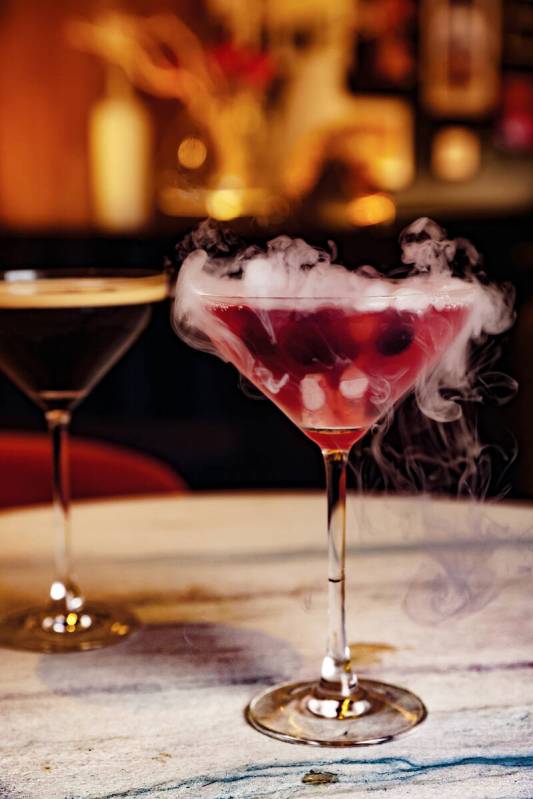 The Berries & Bubbles cocktail, made of Belvedere organic Lemon and Basil Vodka, marinated ...