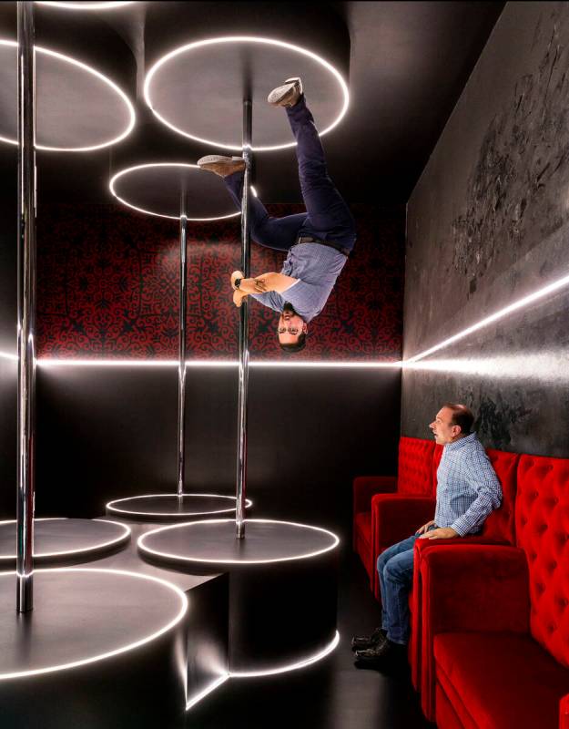 General manager Rob Wilson, top, appears to defy gravity with sales and marketing manager Billy ...