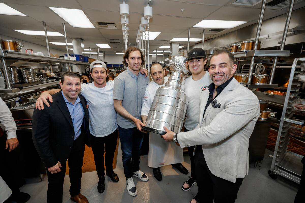 Golden Knights Jonathan Marchessault, Mark Stone and Zach Whitecloud; Chef Barry Dakake, and Ba ...
