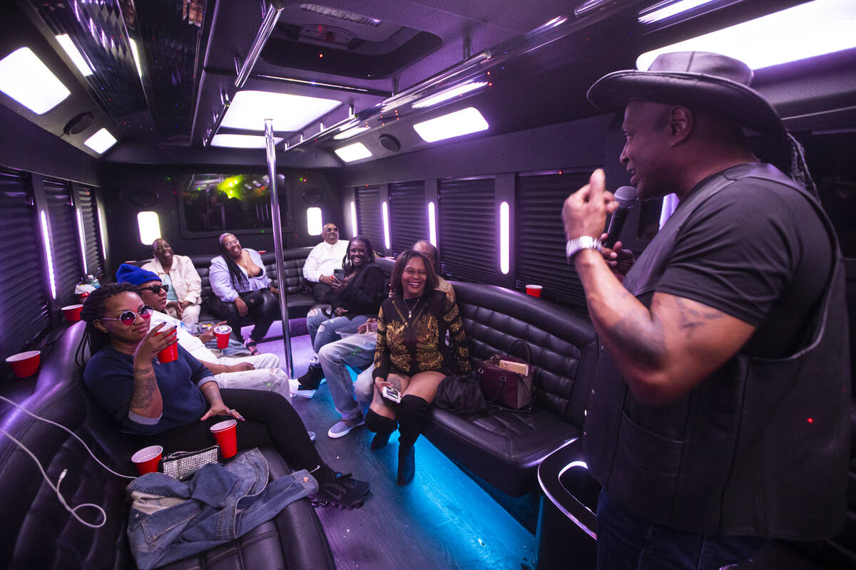 Comedian Smiley Joe Wiley. right, entertains the crowd during the Best Comedy Show on Wheels bu ...