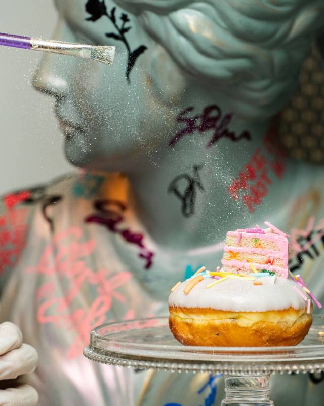 A classic bust brightened with graffiti from Donutique, which debuted in August 2023 in The Ven ...