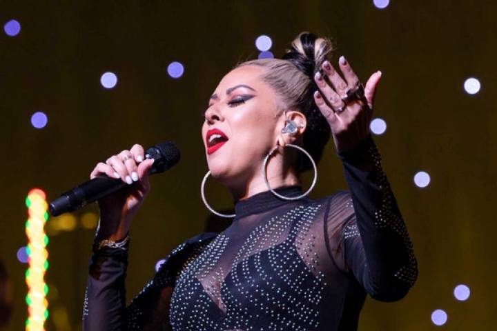 Rockie Brown is shown singing with David Perrico's Pop Symphonic orchestra at Reynolds Hall at ...