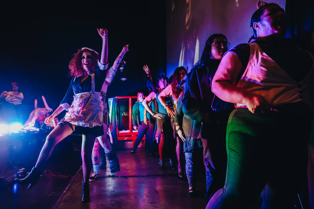 Actors rehearse the Time Warp dance from “Rocky Horror Picture Show” as it plays ...
