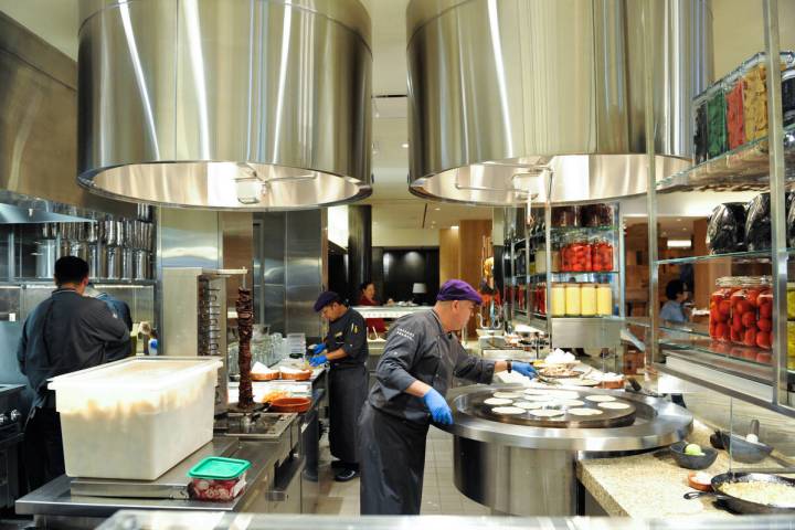 Chefs prepare food in the Mexican kitchen of the Bacchanal Buffet at Caesars Palace, 3570 Las V ...
