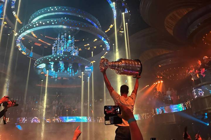 Keegan Kolesar holds aloft the Stanley Cup at Omnia at Caesars Palace after the Vegas Golden Kn ...
