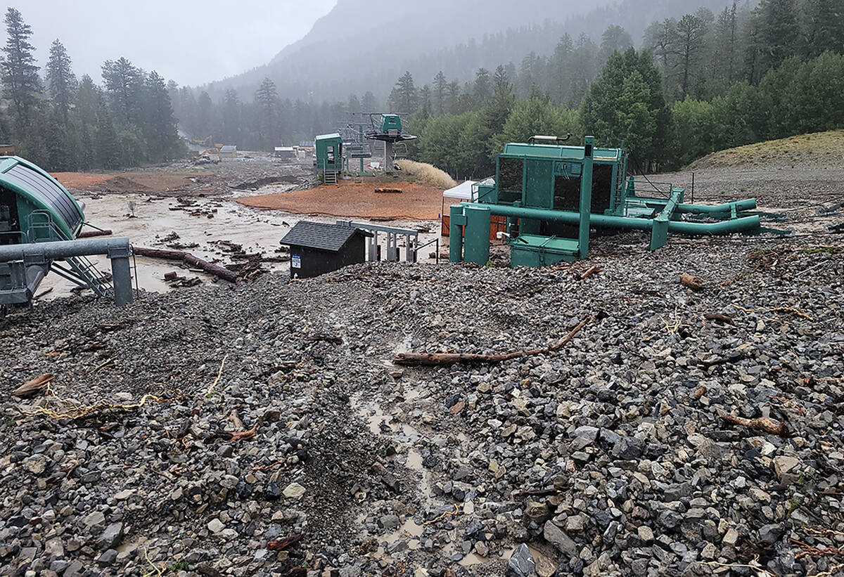 Thousands of tons of rock and debris at a Lee Canyon chairlift following Tropical Storm Hilary ...