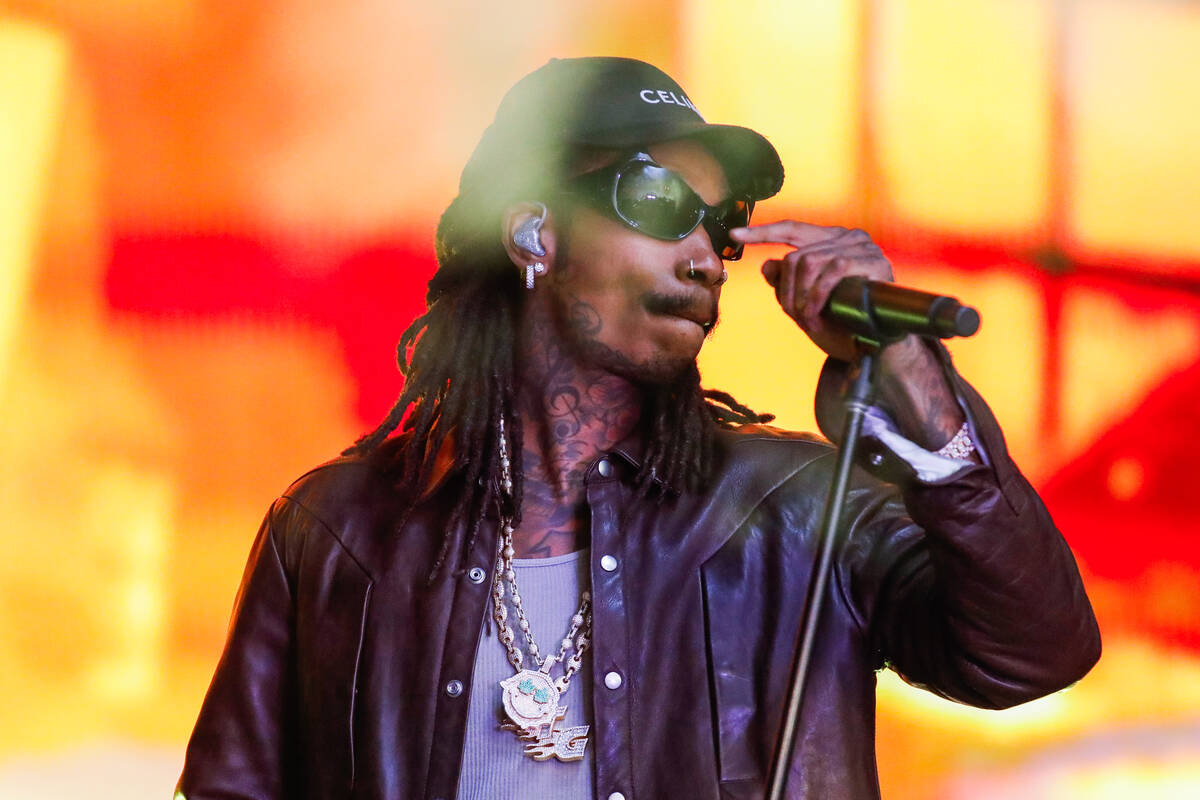 Wiz Khalifa looks to the crowd during a performance at the 2023 SEMA Fest on Friday, Nov. 3, 20 ...
