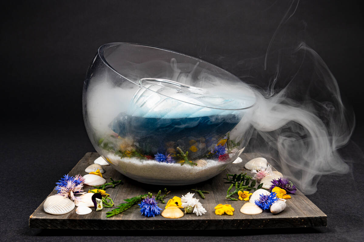 Heart of the Ocean, a Show Stopper cocktail from Easy's Cocktail Lounge, a speakeasy hidden beh ...