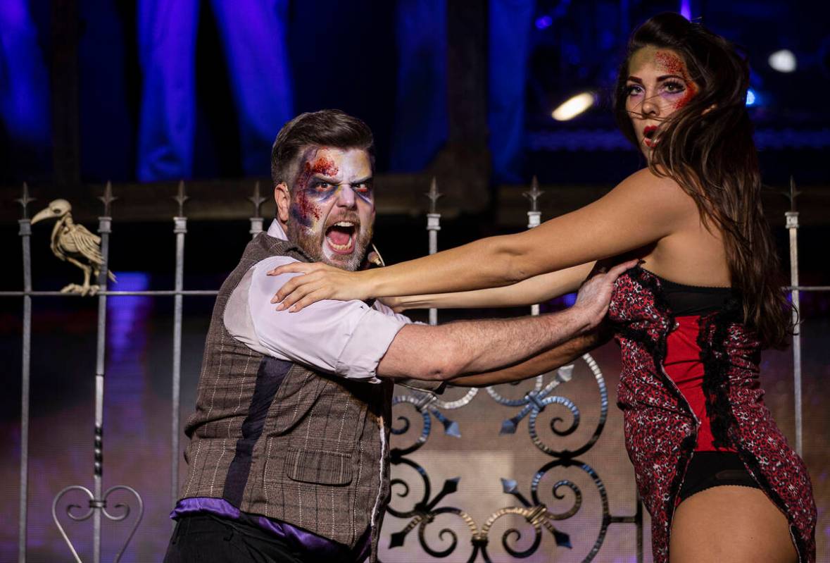 Enoch Augustus Scott, left, performs in “Zombie Burlesque" at V Theater on Monday, ...